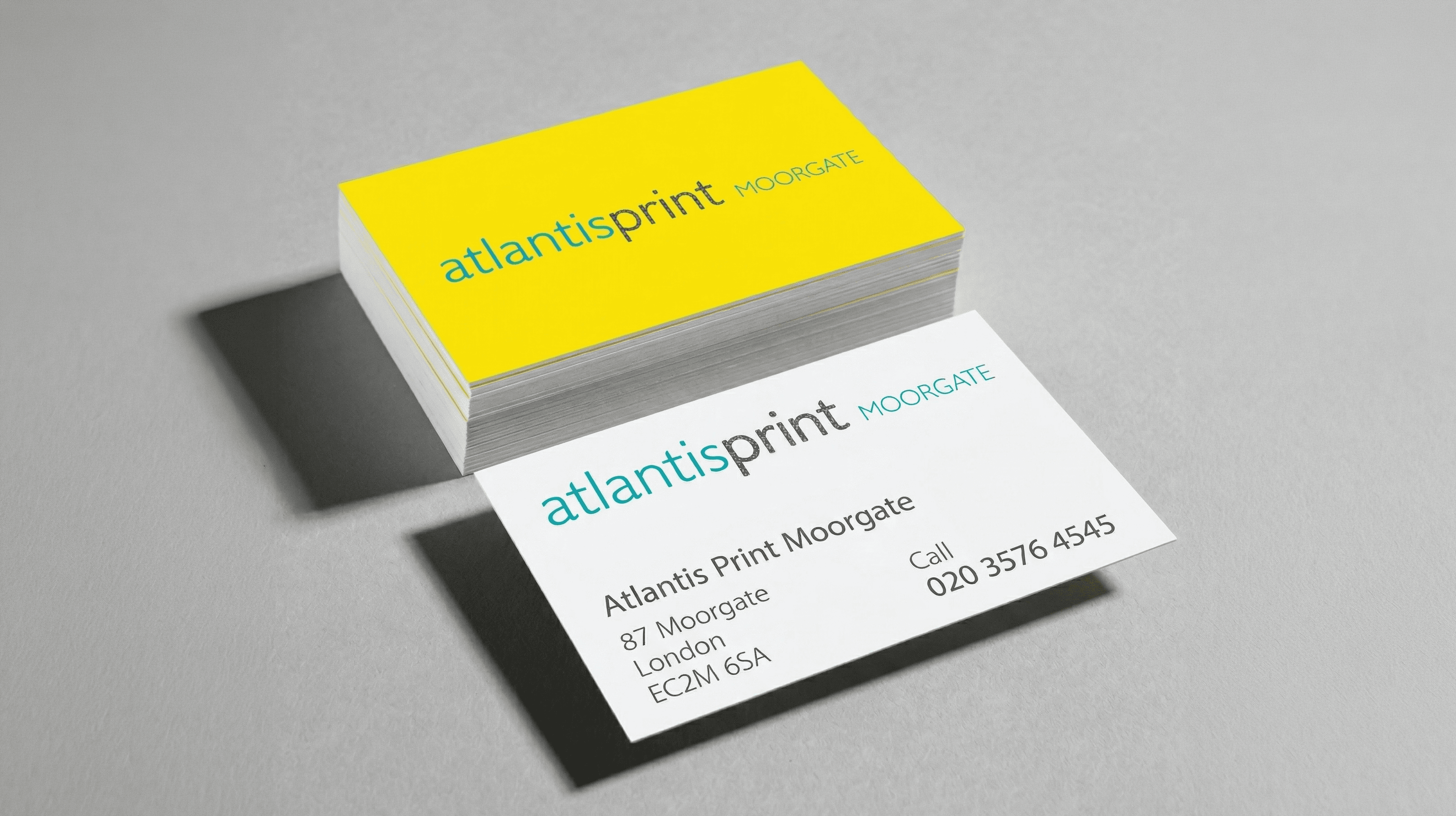 Various premium business cards with different print finishes.